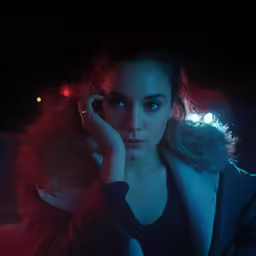 an image of a beautiful girl talking on her phone