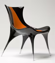 an art - deco chair with an orange accent