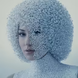 the woman has many large pieces of hair