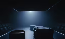 a room filled with lots of black leather furniture