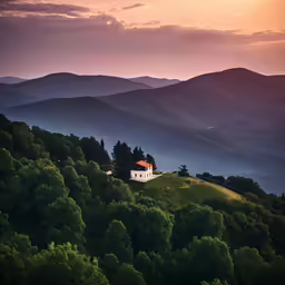 a church in the middle of a mountain range