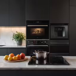 kitchen with black appliances and fruit on the counter