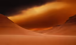 a large rock outcropping in the desert is dark and orange as the sun goes down