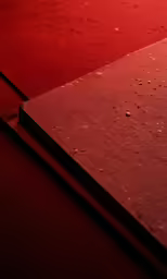 a close up view of an orange sheet on a table