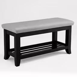 a gray and black bench with two shelves