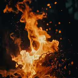 this fire is lit and glowing brightly in the dark