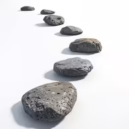 a bunch of rocks are on the white surface