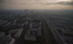 an aerial view of some very tall buildings in a city