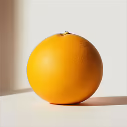 an orange sitting against a white background in a room