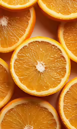 sliced oranges laid out on a table