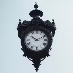 an ornate clock hangs off of a light pole