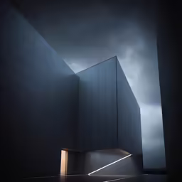 a concrete structure with its lighting shining on it
