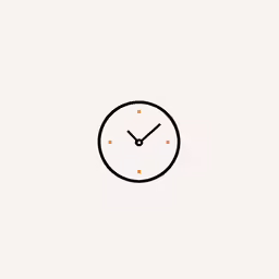 a clock in front of a white background