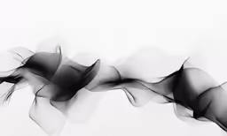 black smoke in white is blowing in the wind