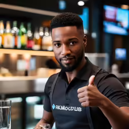 a man giving thumbs up in front of a bar