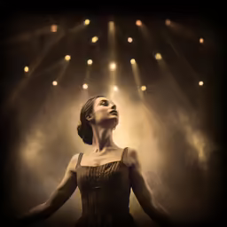 woman in front of spotlights, her face illuminated by lights