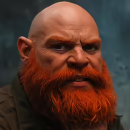 a close up shot of the red haired man
