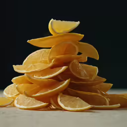 a pile of orange slices on top of each other
