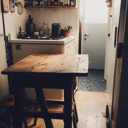 a kitchen filled with lots of brown and white appliances