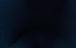 a dark blue background with very little speckles