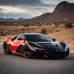 the sports car on the road near mountains