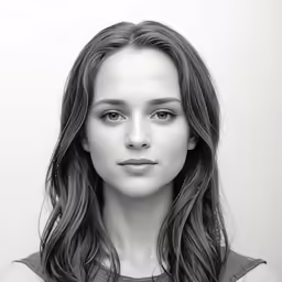 a woman in black and white with long hair