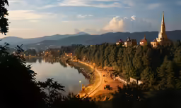 a lake surrounded by a group of tall buildings