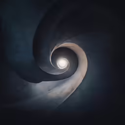 the light from above a spiraly stairwell