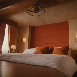 there is a made up bed in a hotel room