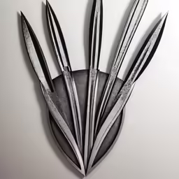 a sculpture made out of silver and black scissors