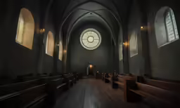 a church with pews and a round window