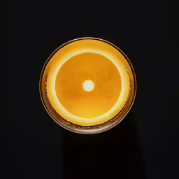 light shines on the black surface below it