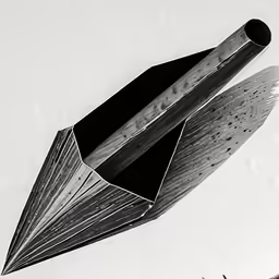 a sculpture with a long pointed structure with many sections sticking out of it