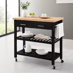 a kitchen cart with a cutting board on it