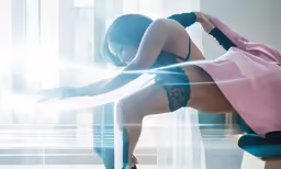 a woman in tight panties holding a piece of plastic