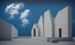 a building with several steps, and blue sky in the background