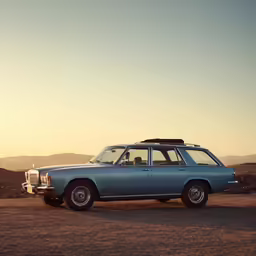 a car that is parked on some dirt