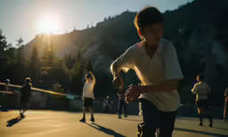 a young boy skateboards on a concrete ramp