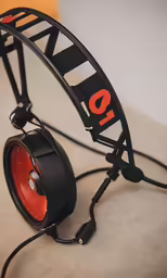 a set of headphones with the word halo written in orange