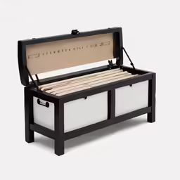 a bed with an open lid sitting in front of a white background