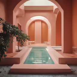a pool is shown with some chairs in front