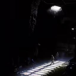 the back lights on stage are shining in
