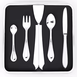 a tray holds spoons and utensils on it