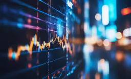 a background made up of lights and a stock chart