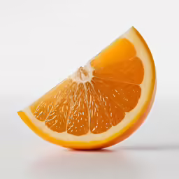 a sliced orange sitting on top of a table