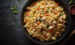 an overhead view of some noodles with vegetables