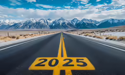 a street with mountains in the background and a yellow arrow pointing at the center