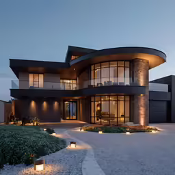 this is a beautiful modern house at dusk