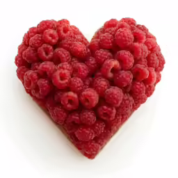 raspberry heart shaped pastry with one bite missing