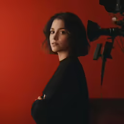 a close - up of a woman in front of a camera
